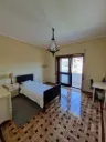 Central private room with shared Balcony