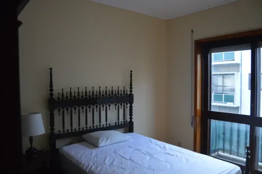 Quarto individual central com Varanda